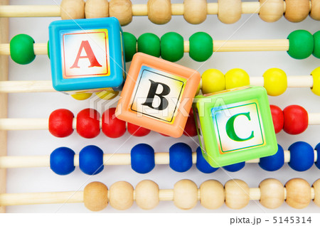 Alphabet blocks and abacus isolated on white Alphabet blocks and abacus isolated on white 5145314