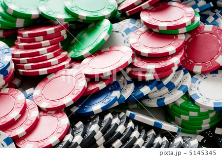 Stack of various casino chips - gambling concept 5145345