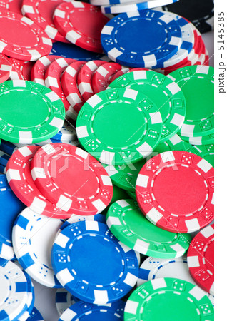 Stack of various casino chips - gambling concept 5145385