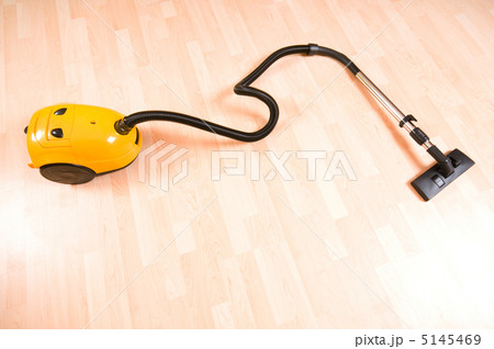 Vacuum cleaner on the polished wooden floor Vacuum cleaner on the polished wooden floor 5145469