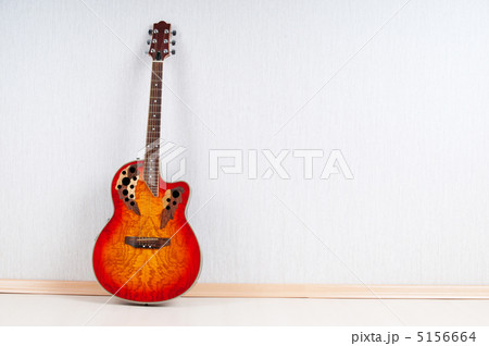 Musical concept with wooden guitar Musical concept with wooden guitar 5156664