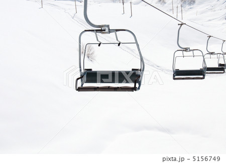 Ski lift chairs on bright winter day 5156749