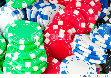 Stack of various casino chips - gambling concept 5158941