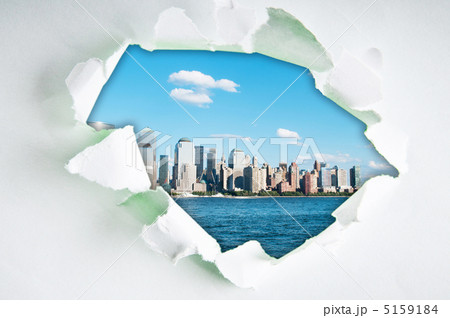 New York city through hole in paper New York city through hole in paper 5159184