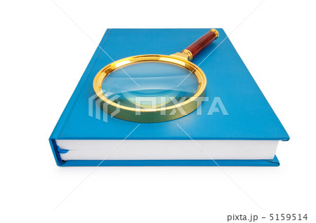 Magnifying glass over the stack of books Magnifying glass over the stack of books 5159514