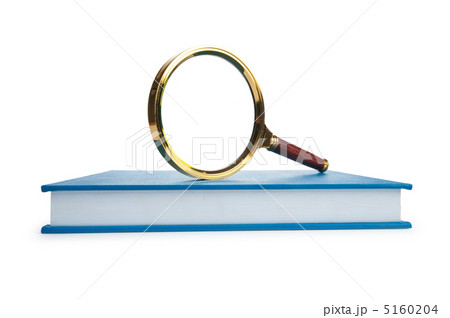 Magnifying glass over the stack of books Magnifying glass over the stack of books 5160204