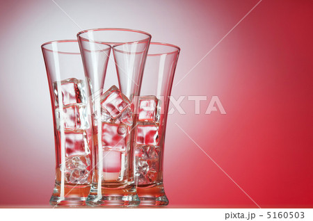 Glasses of water against gradient background Glasses of water against gradient background 5160503