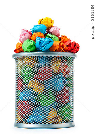 Garbage bin with paper waste isolated on white 5161584