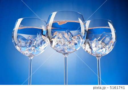Water in the glass against gradient background 5161741