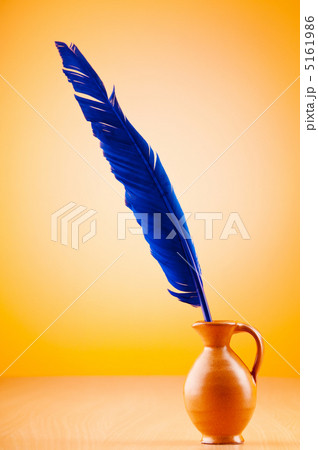 Writing feather against gradient background 5161986