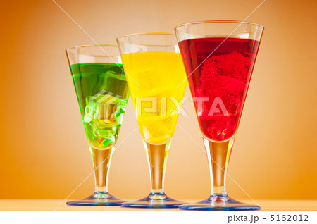 Colourful cocktail in glasses Colourful cocktail in glasses 5162012