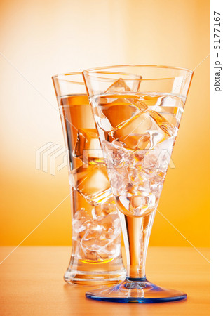 Water in the glass against gradient background 5177167