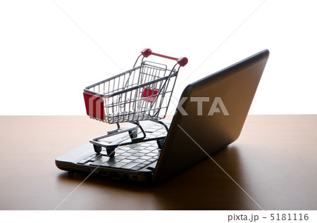 Silhoette of shopping cart and laptop 5181116