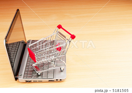 Internet online shopping concept with computer and cart 5181505