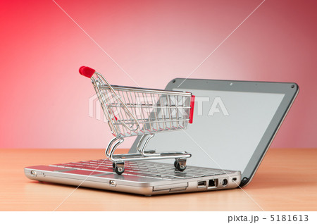 Internet online shopping concept with computer and cart Internet online shopping concept with computer and cart 5181613