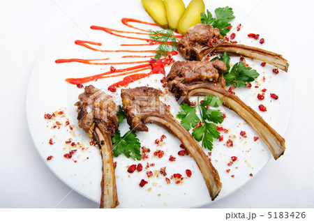 Lamb ribs served in the plate 5183426