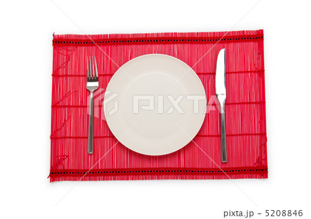 Plate and utensils served on table 5208846