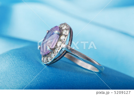 Jewellery ring on the satin background Jewellery ring on the satin background 5209127