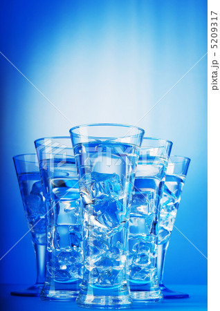 Water in the glass against gradient background 5209317