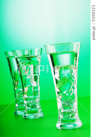 Water in the glass against gradient background Water in the glass against gradient background 5209321