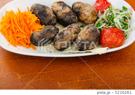 Baked potatoes in the plate Baked potatoes in the plate 5210261