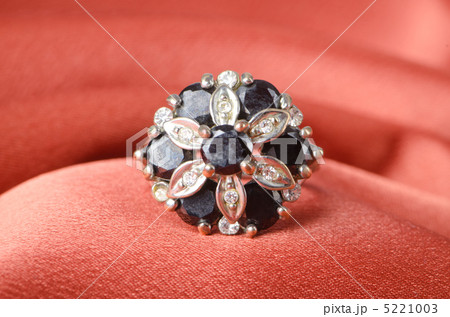 Jewellery ring on the satin background 5221003