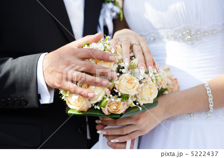 Hands of bride and groom Hands of bride and groom 5222437