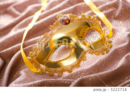 Golden mask on the satin background Golden mask on the satin background 5222718