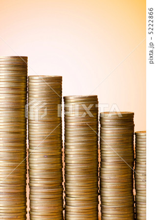 Golden coins in high stacks Golden coins in high stacks 5222866
