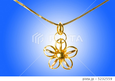 Golden jewellery against gradient background Golden jewellery against gradient background 5232559