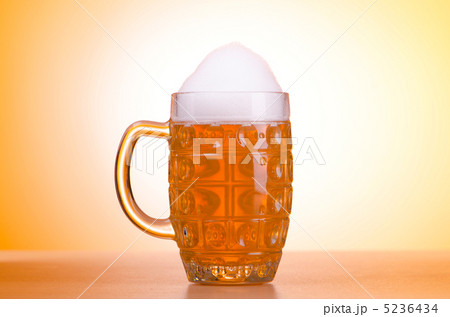 Beer glass on the table Beer glass on the table 5236434