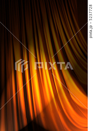 Brightly lit curtains in theatre concept 5237728