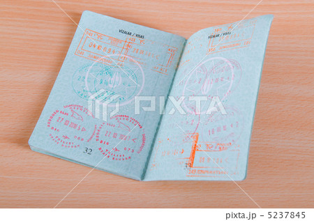 Passport with airport stamps Passport with airport stamps 5237845