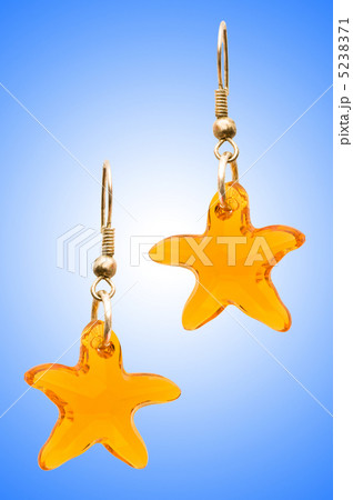 Beauty fashion concept with earrings Beauty fashion concept with earrings 5238371