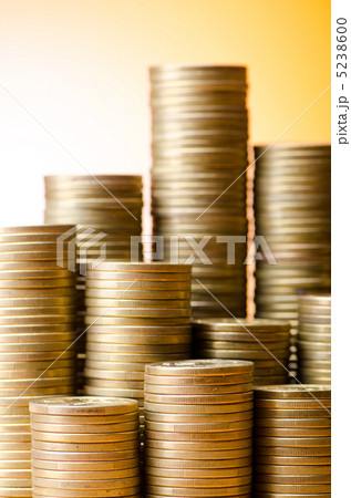 Golden coins in high stacks Golden coins in high stacks 5238600