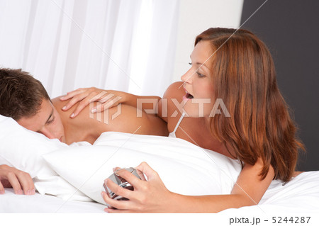 Young woman waking up man Young woman waking up man 5244287