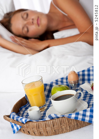 Young woman having home made breakfast Young woman having home made breakfast 5245812