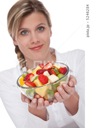 Healthy lifestyle series - Woman holding fruit salad Healthy lifestyle series - Woman holding fruit salad 5246284
