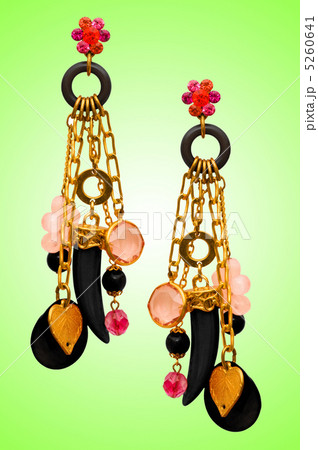 Jewellery concept with nice earrings Jewellery concept with nice earrings 5260641