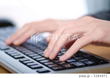 Hands typing on the keyboard 5264971
