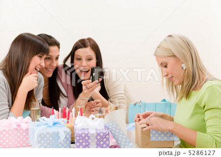 Birthday party - cheerful woman take photo with camera Birthday party - cheerful woman take photo with camera 5286127