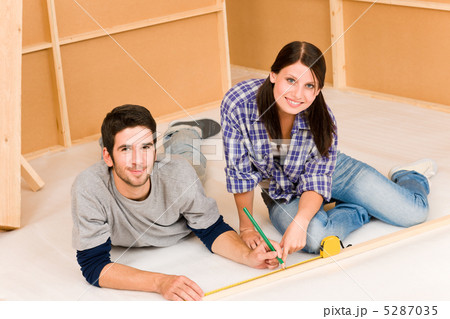 Home improvement young couple work on renovations Home improvement young couple work on renovations 5287035