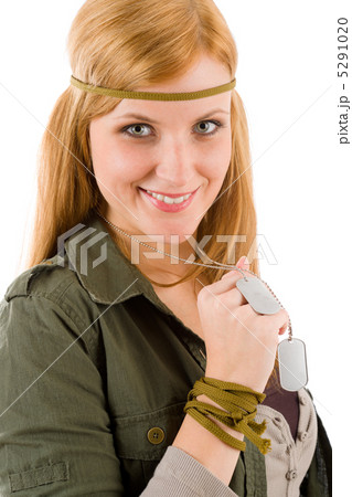 Hippie young woman in khaki outfit hold dog-tag 5291020