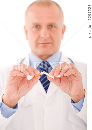 Stop smoking mature male doctor break cigarette 5291528