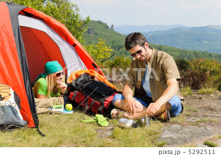 Camping young couple with tent summer countryside Camping young couple with tent summer countryside 5292511