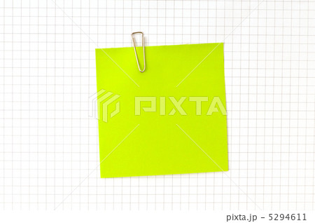 Green note with clip on the paper Green note with clip on the paper 5294611