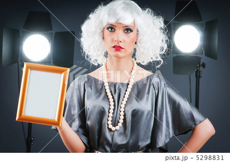 Young attractive girl with in the studio shooting 5298831