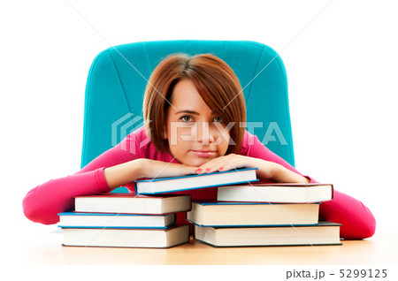 Young female student with many study books Young female student with many study books 5299125