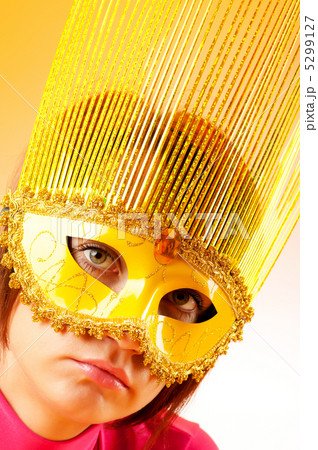 Attractive woman posing in the stylish mask Attractive woman posing in the stylish mask 5299127