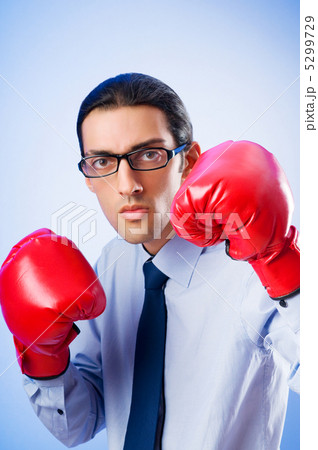 Businessman with boxing gloves 5299729